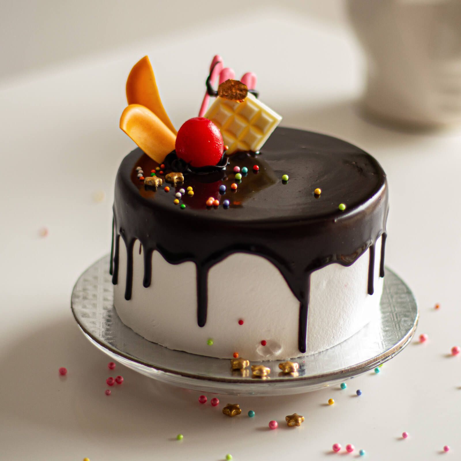 Variety of Mini Cakes with different flavors and toppings.